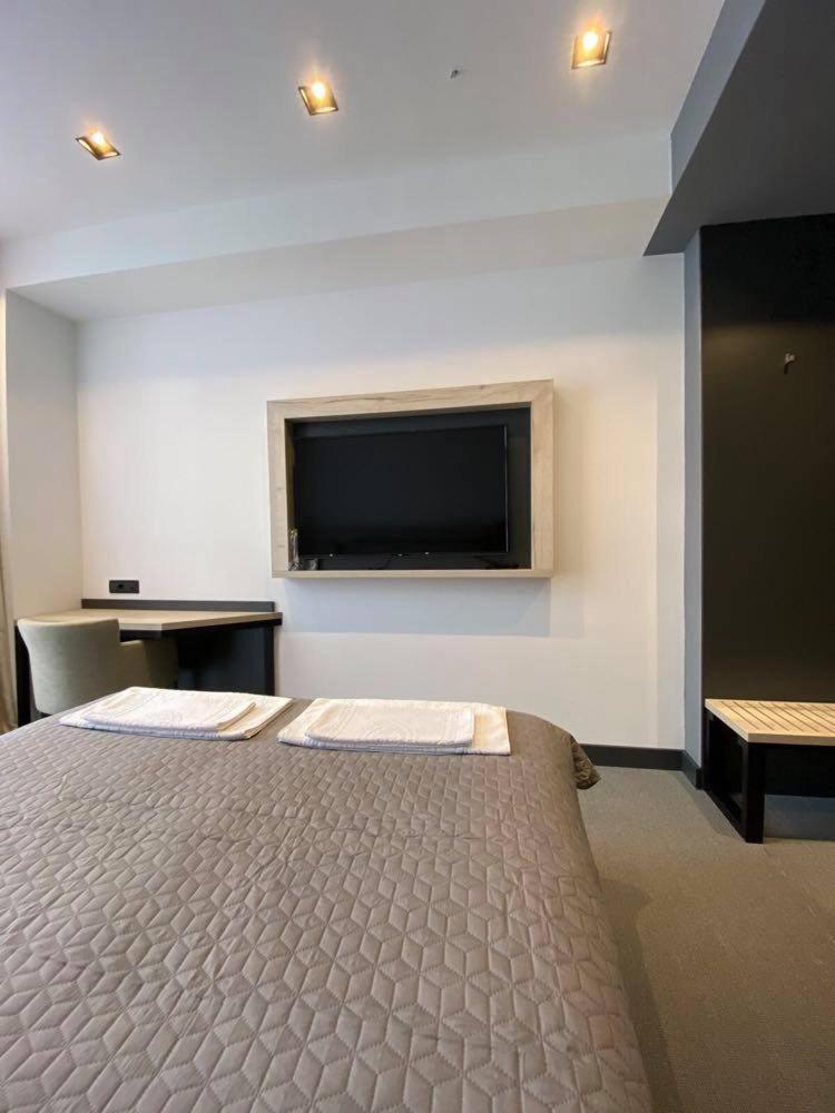 Super Seven Inn Belgrado Quarto foto